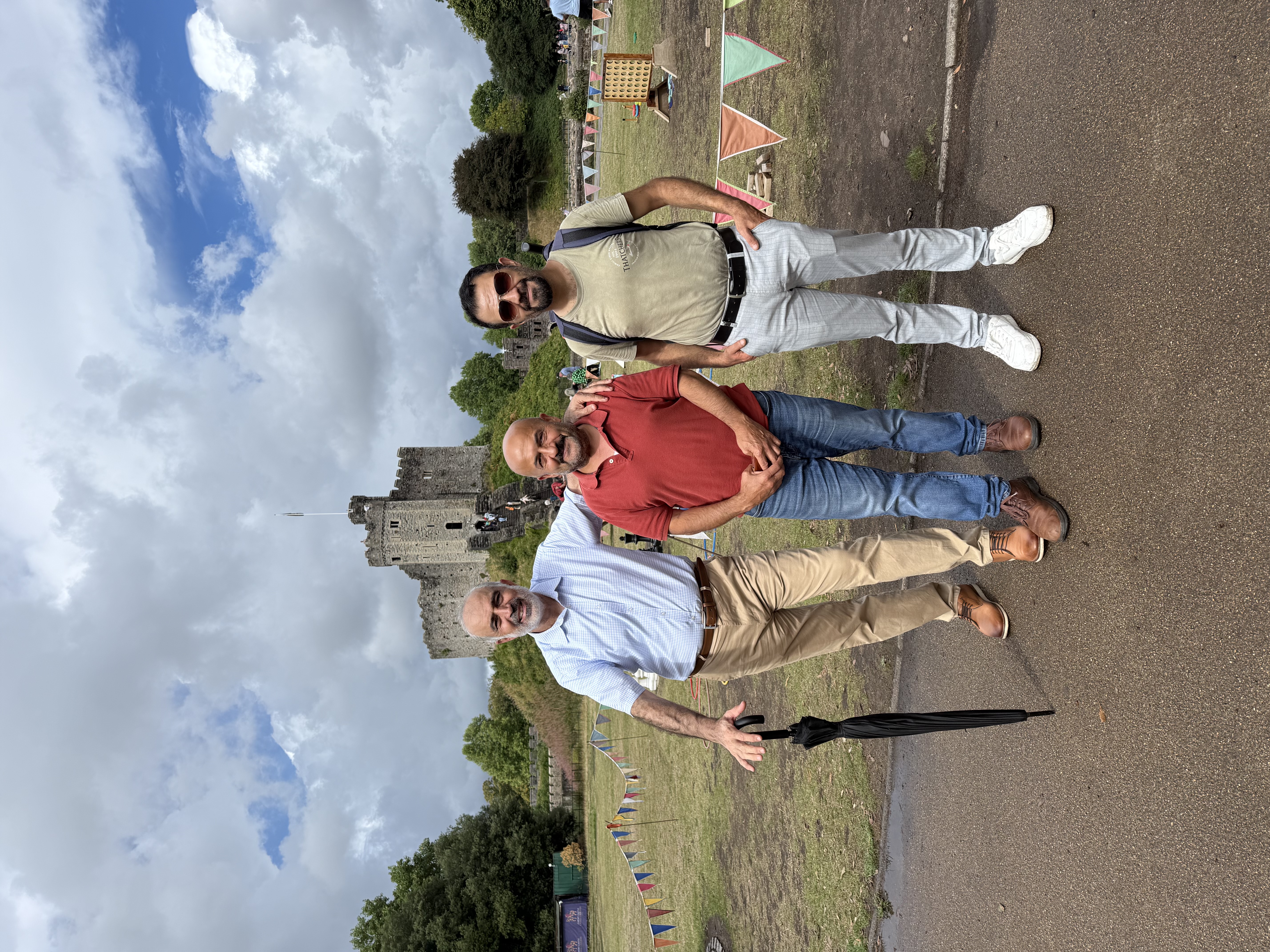 A small group visiting a historic landmark outdoors
